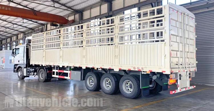 Tri Axle 60 Ton Fence Cargo Truck Trailer for Sale in Sudan Tri Axle 60 Ton Fence Cargo Truck Trailer will be sent to Sudan    Sudan customers found us through Alibaba and wanted to order a batch of tri axle fence  cargo truck trailers. Later, I learned that the customer was very concerned about the delivery date, the customer terminated the cooperation with the previous supplier because of the delivery date.  Of course, after many investigations, the customer finally chose TITAN. Of course, the sales manager Sunny said that TITAN's delivery time customers don't have to worry about it. We will ensure the normal delivery of fence truck trailer.   TITAN ship nearly 150 units side wall semi trailers and fence cargo truck trailers to Sudan every year. Our Semi trailers are very popular in Sudan. The side boards of this model fence truck trailer is very high and can carry more bulk cargo. Customers say that we are the most professional manufacturer.    Tri Axle 60 Ton Fence Cargo Truck Trailer for Sale in Sudan  Tri Axle 60 Ton Fence Cargo Trailer for Sale in Sudan    Fence truck trailer specifications: Tare Weight: About 8.3T  Dimension(mm): 13000x2500x3490mm  Loading capacity(ton): ≤60T  Axles: 3 axles, 13T/16T ,FUWA/ BPW/ Huajing Brand  Tire: 12 units, 12.00R22.5 or 315/80R22.5  Rim: 9.00-22.5 or 9.75-22.5  Suspension: Mechanical, Bogie, Airbag suspension(China brand or BPW brand)  Spring Leaf: 90(W)mmx13(Thickness)mmx10 layers or 100mmx12mmx12 (specially intended for overseas markets)  King Pin: JOST brand 2.0 or 3.5 inch (bolted or welded)  Landing Gear: JOST brand D200T or Chinese brand 28tons(double-speed)  Main Beam: Height: 500mm, Upper plate:14mm, Middle plate:8mm, Bottom plate:16mm, Material:Q345B steel  Bottom Side Beam: 16mm or 18mm steel channel (material: Q235 steel)  Platform: 3mm-thick checkered plate  Trailer Sides: 600-2000mm, or box type sides  Brake Chamber: WABCO RE 6 relay valve; T30/30+T30 spring brake chamber(TKL brand), 45L air tank  Twist Locks: 4,8,12 sets (lifting or screw type)  Valve: WABCO valve (specially intended for oversea market)  ABS: Optional  Light: LED light (specially intended for oversea market)  Voltage: 24V  Socket(Receptacle): 7-pin Socket (for 7 wire harness)  Tool Box: 1m x 0.5m x 0.5m (The tool box contains 1 tire spanner, 1 gudgeon sleeve and 1 cranking bar. Its size can be tailored to suit your needs)   Painting: Sandblasted, anti-rust chassis surface is available with 1 layer of anticorrosive primer and 2 layers of top coats  Tri Axle 60 Ton Fence Cargo Truck Trailer for Sale (5)Drawing of Tri Axle 60 Ton Fence Cargo Truck Trailer    Details of fence cargo truck trailer 1. The 60 ton fence cargo trailer model and fence structure design process is combined with the user's cargo category, reasonable design, to fully reduce the weight of the carriage under load conditions, the structure is simple and applicable, and it is convenient to disassemble, reduce investment costs for users, and create more profit value.  2. The frame adopts a space frame structure formed by welding longitudinal beams and integral through cross beams. It can balance the strength, rigidity, and toughness of the frame, with strong bearing capacity and no deformation.  3. It adopts a new type of suspension system with high strength and strong impact resistance. The load of each axle is balanced, and the system tie rod angle is reasonably designed to reduce the friction slip distance between the tire and the ground and effectively reduce tire wear during frequent bumps. Under the same road conditions and load capacity, fuel consumption per 100 kilometers can be reduced by more than 1.2 liters.    Tri Axle 60 Ton Fence Cargo Truck Trailer will be sent to Sudan  Tri Axle 60 Ton Fence Cargo Truck Trailer for Sale in Sudan    4. Imported brake pads and implanted wear alarm device. Effectively guarantee the braking performance of the vehicle during operation.  5. The service life of the TITAN tri axle fence truck trailer brake can reach 1.5 million kilometers in 10 years. Brake discs containing alloy elements, anti-cracking, anti-wear and high temperature resistance.  6. The use of low temperature resistant brake air pipe makes driving safer. The 3 axle 60 ton fence cargo semi trailer wiring harness uses 7-core wiring harness, without any grounding treatment, the lamp can work normally, the use failure rate is low, and it does not need to be replaced for life.    Tri Axle 60 Ton Fence Cargo Truck Trailer for Sale in Sudan  Tri Axle 60 Ton Fence Cargo Truck Trailer in TITAN Factory    You can download video, you can learn about different types of fence semi trailer for sale(like 3 axle fence trailers, 4 axle stake trailer and fence full trailer).And the process, testing, packaging and customer feedback, etc.  Welcome to download our quotation, if you have other questions, please contact us    60ton Tri Axle Fence Trailer for Sale in Nigeria Lagos