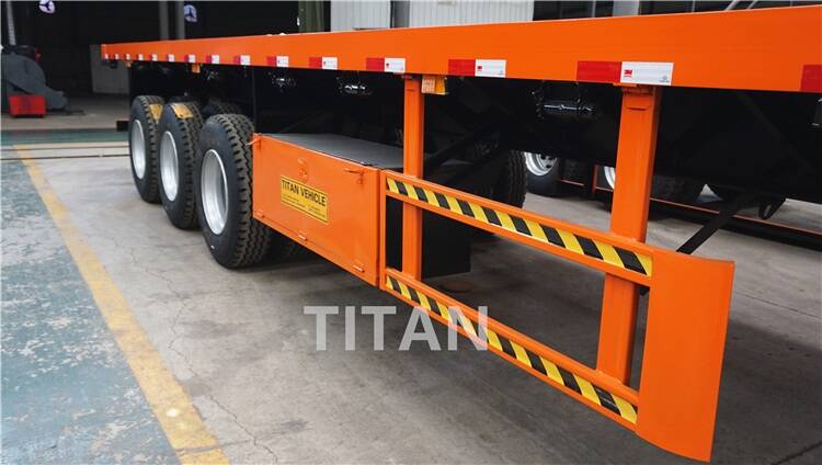 The flatbed tri axle trailer with one toolbox