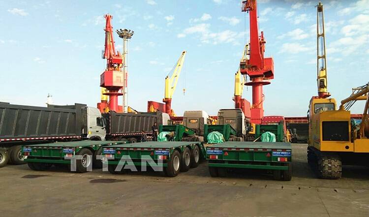 TITAN lowboy trailer wait for delivery in port