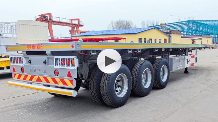 Camion à trois essieux avec remorque à plateau à Trinité-et-Tobago