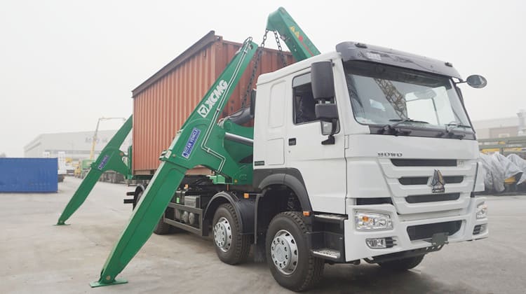 Camion à chargement latéral pour conteneurs de 37 tonnes : 75 000 USD Ce camion à chargement latéral pour conteneurs de 37 tonnes est un équipement logistique conçu pour le transport lourd, avec une forte capacité de charge, un mécanisme de chargement efficace et d'excellentes performances de manutention. La capacité de charge maximale du camion à chargement latéral pour conteneurs peut atteindre 37 tonnes, et le cadre robuste et le système de suspension fiable assurent la stabilité de la conduite lourde. La conception de chargement latéral du camion à chargement latéral pour conteneurs facilite le chargement et le déchargement des conteneurs et améliore l'efficacité du travail.  La conception avancée de la cabine et les sièges confortables du camion à chargement latéral pour conteneurs en Tanzanie offrent un bon environnement de travail au conducteur, et le système de suspension et le mécanisme de direction sont soigneusement ajustés pour assurer un contrôle stable. La sélection de matériaux et de processus de fabrication de haute qualité, ainsi que le contrôle qualité strict des composants clés garantissent la durabilité du camion à chargement latéral pour conteneurs. L'utilisation d'une technologie de moteur avancée a une faible consommation de carburant et des niveaux d'émission, réduisant les coûts d'exploitation et réduisant l'impact environnemental.  Camion à chargement latéral pour conteneur de 37 tonnes à vendre en Tanzanie Dar Es Salaam  Camion à chargement latéral pour conteneur de 37 tonnes à vendre en Tanzanie Dar Es Salaam  Camion à chargement latéral pour conteneur de 37 tonnes à vendre en Tanzanie Dar Es Salaam  Spécification du camion à chargement latéral pour conteneur de 37 tonnes Capacité de levage max. : 37 tonnes Fonction : Charger une remorque porte-conteneur de 20 pieds Châssis de remorque : 12000*2500*4000mm Essieux : 2 essieux Pneu : 8 unités Train d'atterrissage : JOST Source d'alimentation : Prise de force/APU diesel Fonctionnement : Télécommande sans fil et fonctionnement manuel  Avantages du camion à chargement latéral pour conteneur de 37 tonnes Construit en acier haute résistance, le camion à chargement latéral pour conteneur disponible à l'achat possède une excellente capacité de charge et une excellente longévité. Le camion à chargement latéral pour conteneurs en vente en Tanzanie est équipé d'une gamme de dispositifs de sécurité, notamment des mécanismes anti-roulis et antidérapants, pour garantir la sécurité du processus de transport. L'opération est simple, grâce à un système d'exploitation avancé qui facilite les tâches de chargement et de déchargement.  Remorque à chargement latéral pour conteneurs de 45 tonnes et 40 pieds à vendre en Tanzanie Dar Es Salaam Les avantages des camions à chargement latéral pour conteneurs incluent leur efficacité exceptionnelle dans le chargement et le déchargement rapides des conteneurs via une conception à accès latéral, ce qui améliore considérablement la productivité. Le camion à chargement latéral pour conteneurs à vendre offre suffisamment d'espace pour transporter plusieurs conteneurs simultanément, maximisant ainsi le volume de chargement par voyage. Construits avec de l'acier robuste à haute résistance, ces camions à chargement latéral pour conteneurs disponibles en Tanzanie garantissent des performances et une fiabilité durables. Le fonctionnement convivial du camion à chargement latéral pour conteneurs, soutenu par des systèmes de contrôle sophistiqués, rationalise les procédures de chargement et de déchargement. Les camions à chargement latéral pour conteneurs sont polyvalents et adaptables, répondant à diverses exigences dans les ports, les terminaux de fret et les centres logistiques. En résumé, la capacité du camion à chargement latéral pour conteneurs à optimiser les opérations et à réduire les dépenses de main-d'œuvre en fait un choix rentable pour un transport efficace de marchandises conteneurisées.  Remorque à chargement latéral pour conteneurs de 45 tonnes et 40 pieds à vendre en Tanzanie Dar Es Salaam  Processus de fonctionnement du camion à chargement latéral pour conteneurs de 37 tonnes  Remorque à chargement latéral pour conteneurs de 45 tonnes et 40 pieds à vendre en Tanzanie Dar Es Salaam  Emballage du camion à chargement latéral pour conteneurs de 37 tonnes Le transport roulier/roulier joue un rôle essentiel dans l'exportation de camions à chargement latéral pour conteneurs, particulièrement adapté à ceux ayant de grandes dimensions ou des formes uniques. Ce mode de transport unique permet aux camions à chargement latéral pour conteneurs de monter ou de descendre directement du navire, ce qui simplifie grandement le processus de chargement et de déchargement et augmente considérablement l'efficacité. Il peut livrer rapidement des camions à chargement latéral pour conteneurs aux clients, raccourcissant considérablement le cycle de livraison, un aspect crucial pour répondre aux commandes urgentes et maintenir la satisfaction des clients. Des mesures de protection supplémentaires sont mises en œuvre sur le navire roulier/roulier. En plus des dispositifs de fixation professionnels, Tanzaniasinotruk enveloppe également les camions à chargement latéral de conteneurs avec des bâches pour les protéger contre les dommages potentiels causés par l'environnement marin humide et le vent et la pluie inattendus.  Vidéo du camion à chargement latéral de conteneur de 37 tonnes  Camion à chargement latéral de conteneur de 37 tonnes à vendre en Tanzanie Dar Es Salaam